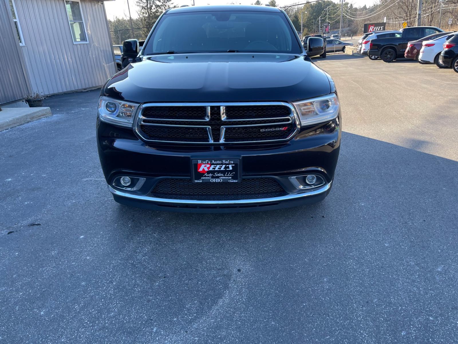 2018 Purple /Black Dodge Durango SXT Plus AWD (1C4RDJAG4JC) with an 3.6L V6 DOHC 24V engine, 8A transmission, located at 547 E. Main St., Orwell, OH, 44076, (440) 437-5893, 41.535435, -80.847855 - This 2018 Dodge Durango SXT Plus AWD is equipped with a powerful 3.6 Pentastar V6 engine paired with an 8-speed automatic transmission, offering a blend of performance and efficiency. This model features a comfortable interior with a power driver's seat, heated front seats, and a heated steering whe - Photo #1